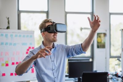 Man Using Augmented Reality Headset in Office